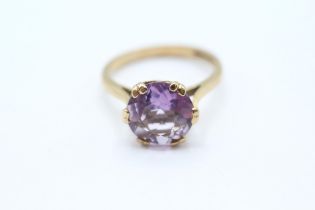 9ct gold vintage amethyst dress ring with a heart patterned gallery. Hallmarked Edinburgh 1968