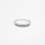 9ct white gold channel set tanzanite eight stone ring Size N - 2.1 g
