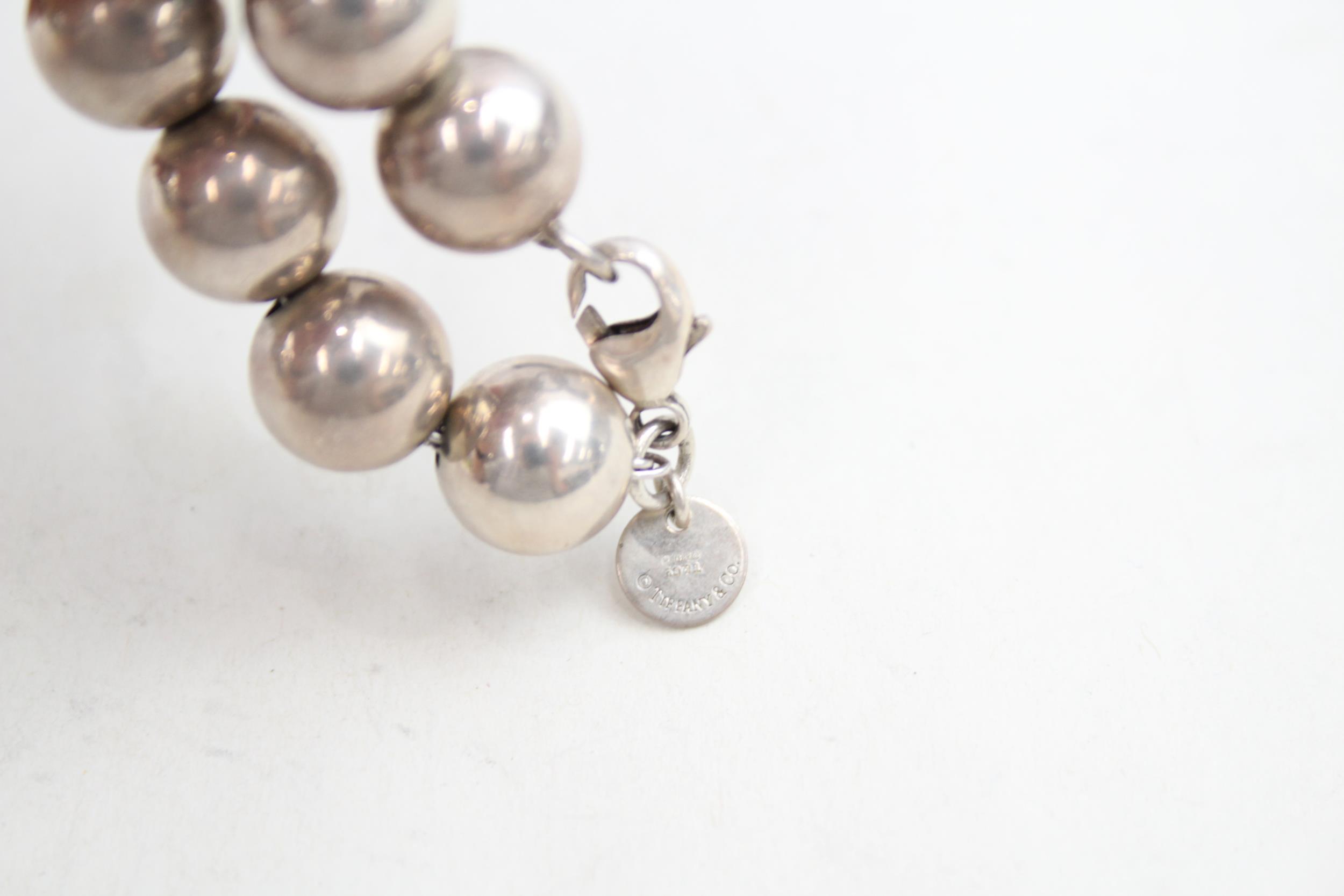 A silver beaded bracelet by Tiffany and Co (20g) - Image 7 of 8