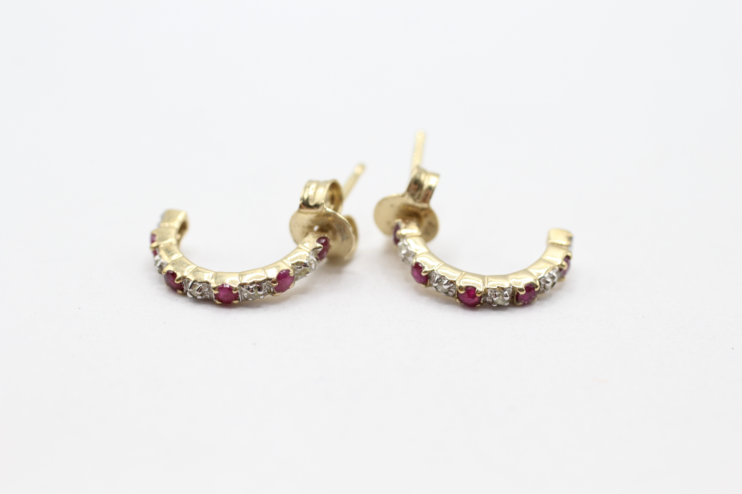 9ct gold ruby & diamond C-hoop earrings with scroll backs - 1.1 g