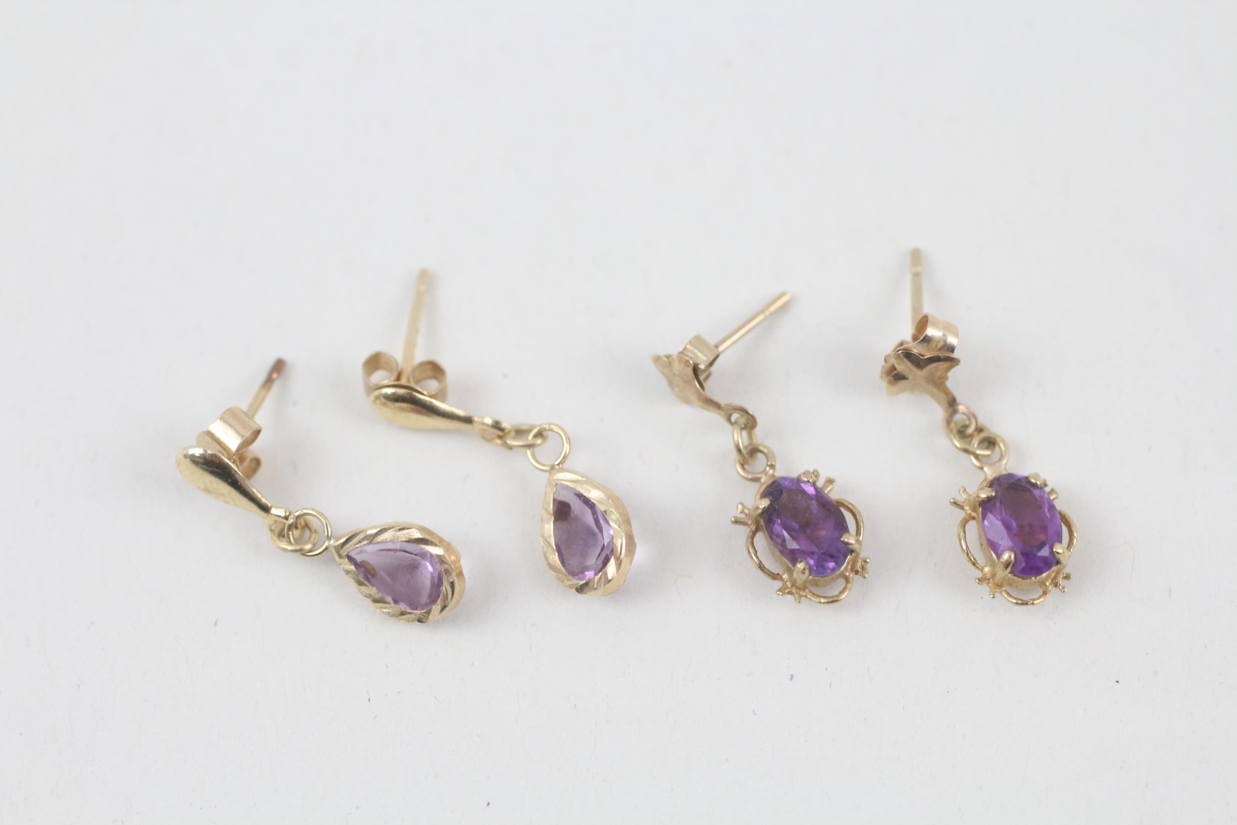 2x 9ct gold amethyst drop earrings with scroll backs - 1.5 g