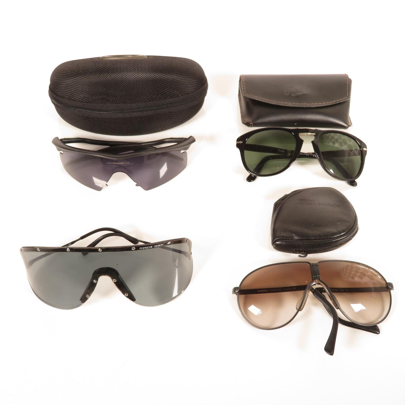 Pair of Porsche Folding Sunglasses, Per Sol folding Sunglasses, Oakley sunglasses and Porsche design
