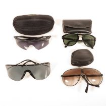 Pair of Porsche Folding Sunglasses, Per Sol folding Sunglasses, Oakley sunglasses and Porsche design
