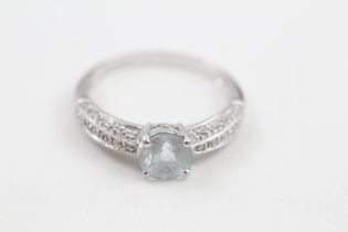 9ct gold aquamarine & diamond three stone ring (3g) Size V