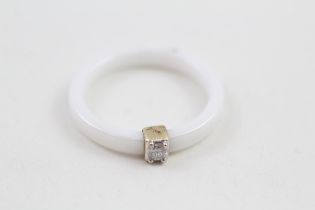 10ct gold diamond solitaire ring with a white centimetric band (3g) Size R