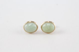 9ct gold cabochon cut jade stud earrings with scroll backs (1.4g)