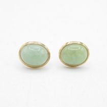 9ct gold cabochon cut jade stud earrings with scroll backs (1.4g)