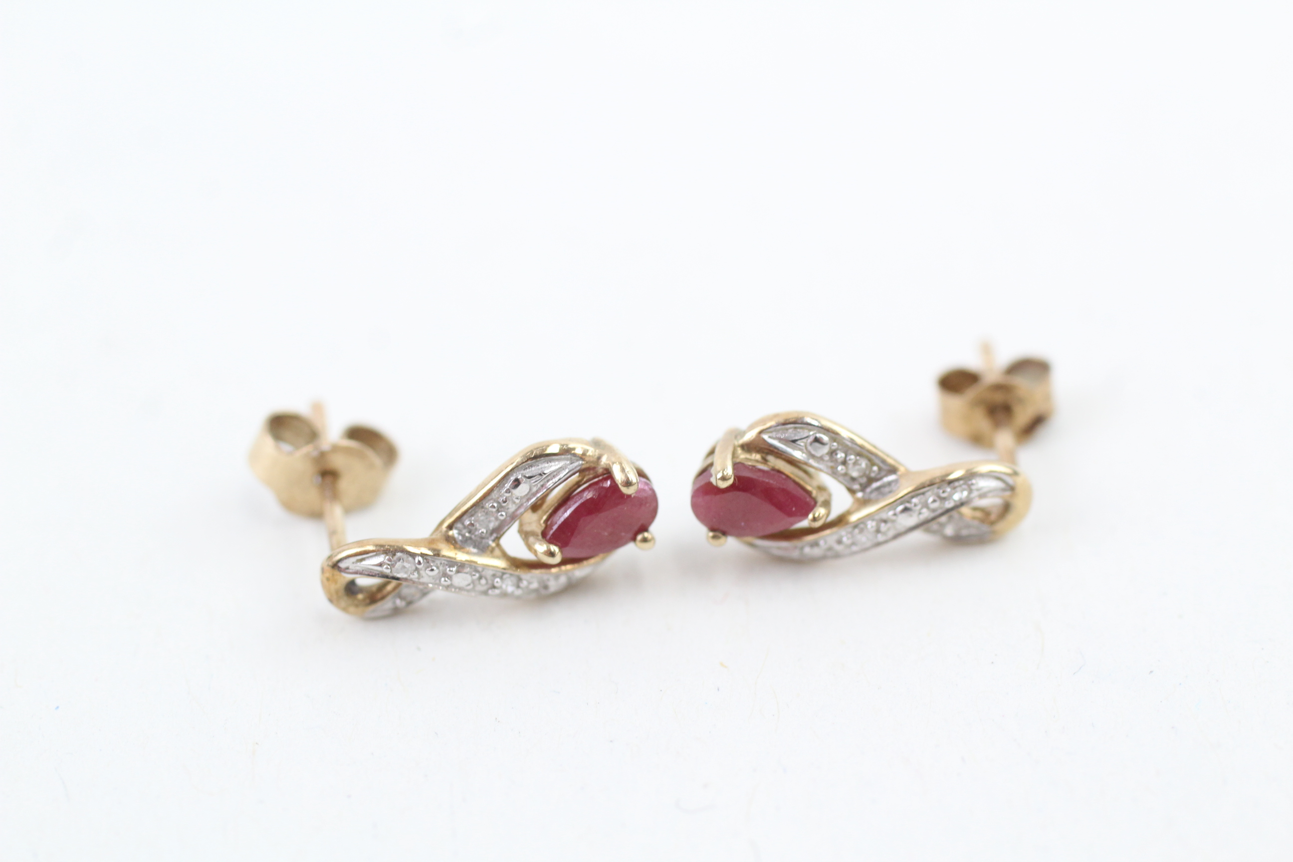 9ct gold ruby & diamond earrings with scroll backs (1.3g)