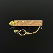 Vintage Krawattennadel, 750/18K Gelbgold (punziert), Gesamtgewicht 13,07g, besetzt mit Peridot und 