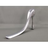 Shoehorn "Manolo Blanik", aluminium, shape of a pump, habitat design, maker's mark on the underside