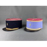 Two Kepis France, French Foreign Legion, each blue/black cloth, gold-coloured braid, red lid, black