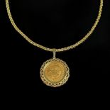 Necklace with gold coin pendant, all parts 333/8K yellow gold (hallmarked), total weight 15.22g, "J