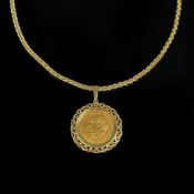 Kette mit Goldmünzen Anhänger, alle Teile 333/8K Gelbgold (punziert), Gesamtgewicht 15,22g, mittig