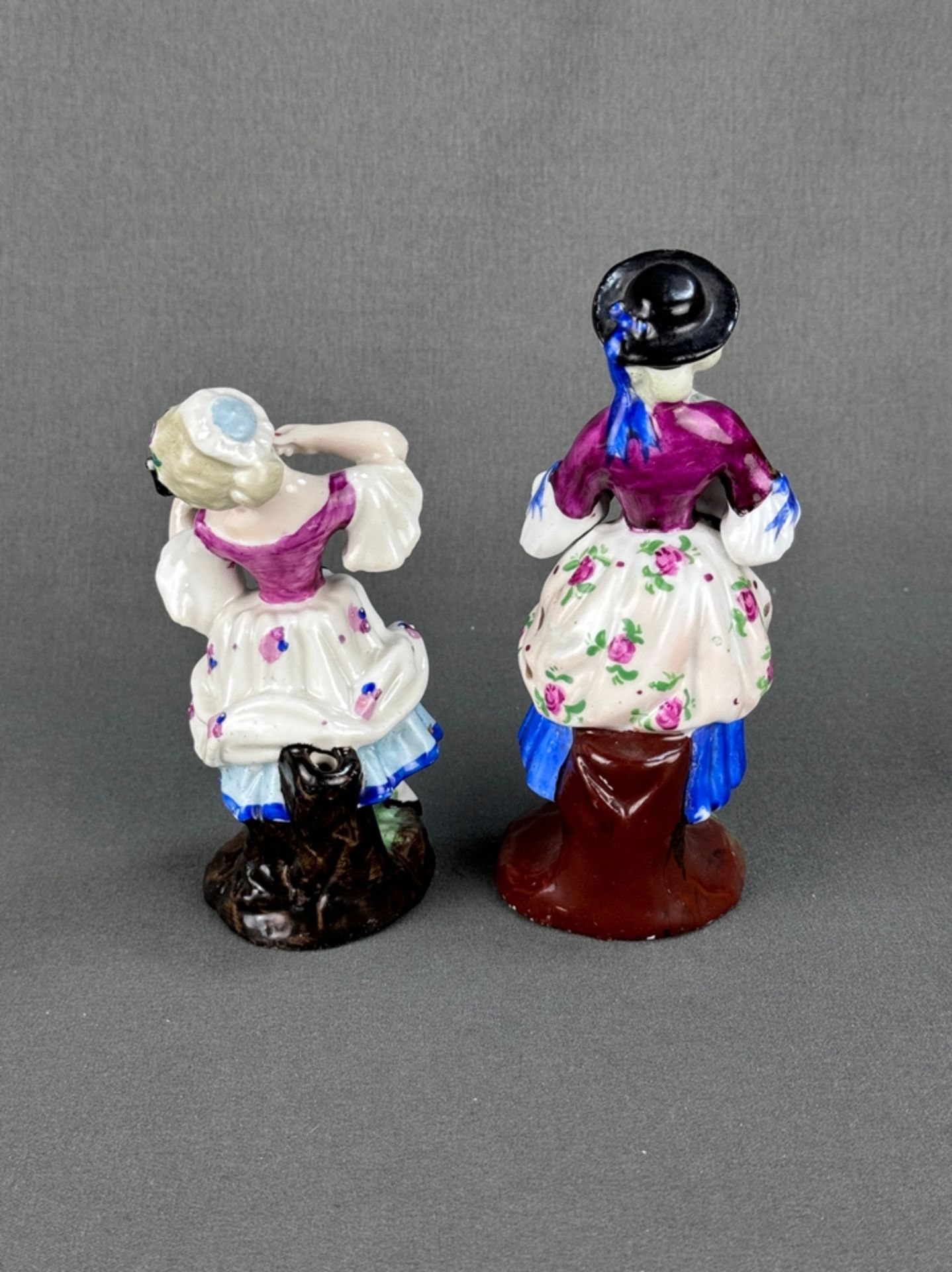 Two porcelain figurines "Woman with mirror" and "Woman with basket of flowers", polychrome hand-pai - Image 2 of 2