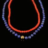 Two necklaces, lapis lazuli and coral, coral necklace with 585/14K yellow gold clasp (tested), leng