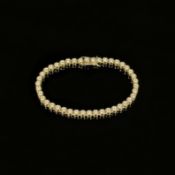 Tennisarmband, 585/14K Gelbgold (punziert), 13,86g, besetzt mit insgesamt 42 Diamanten im Brillants