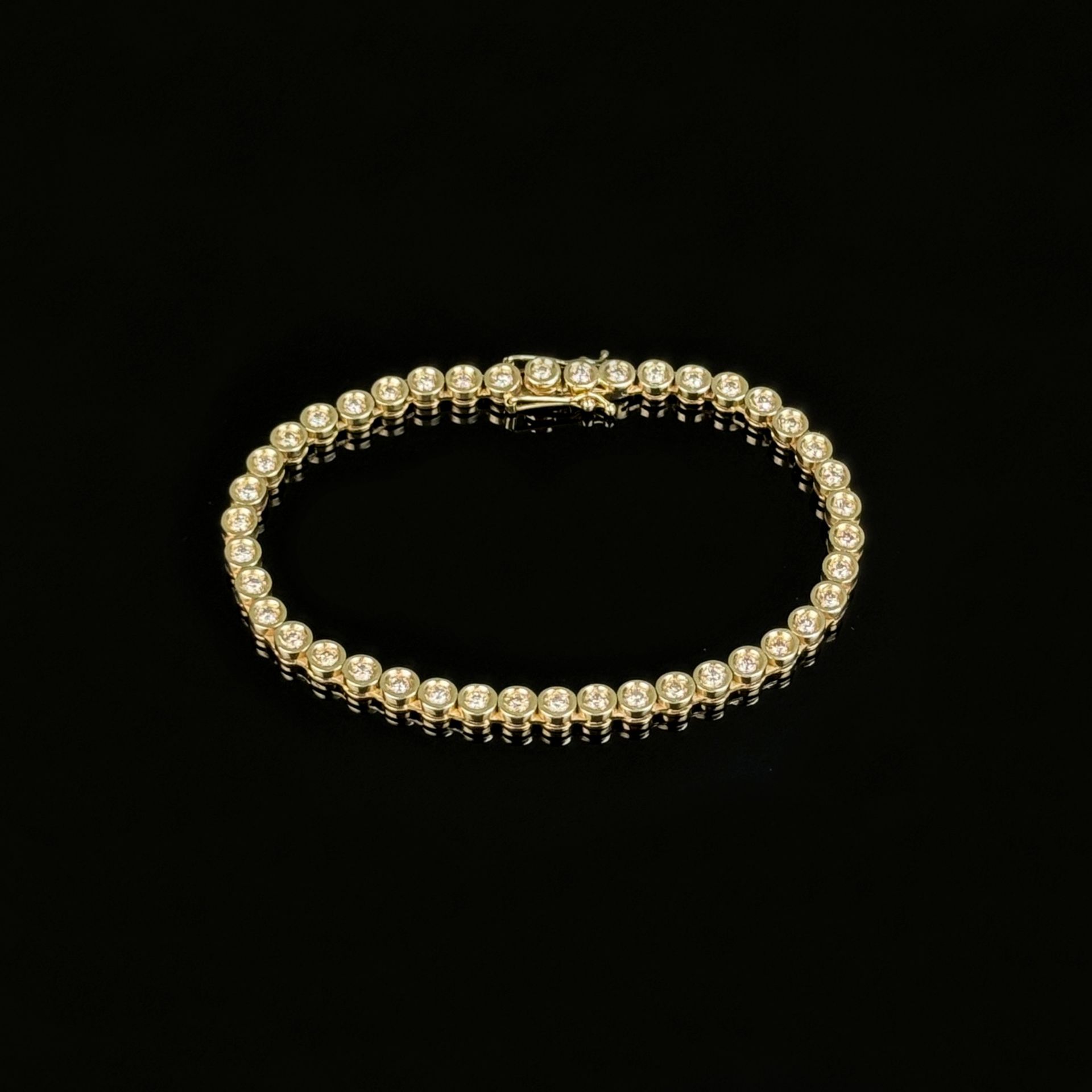 Tennis bracelet, 585/14K yellow gold (hallmarked), 13.86g, set with a total of 42 brilliant-cut dia