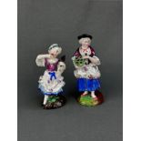 Zwei Porzellanfiguren "Frau mit Spiegel" und "Frau mit Blumenkorb", polychrom handbemalt, auf Natur