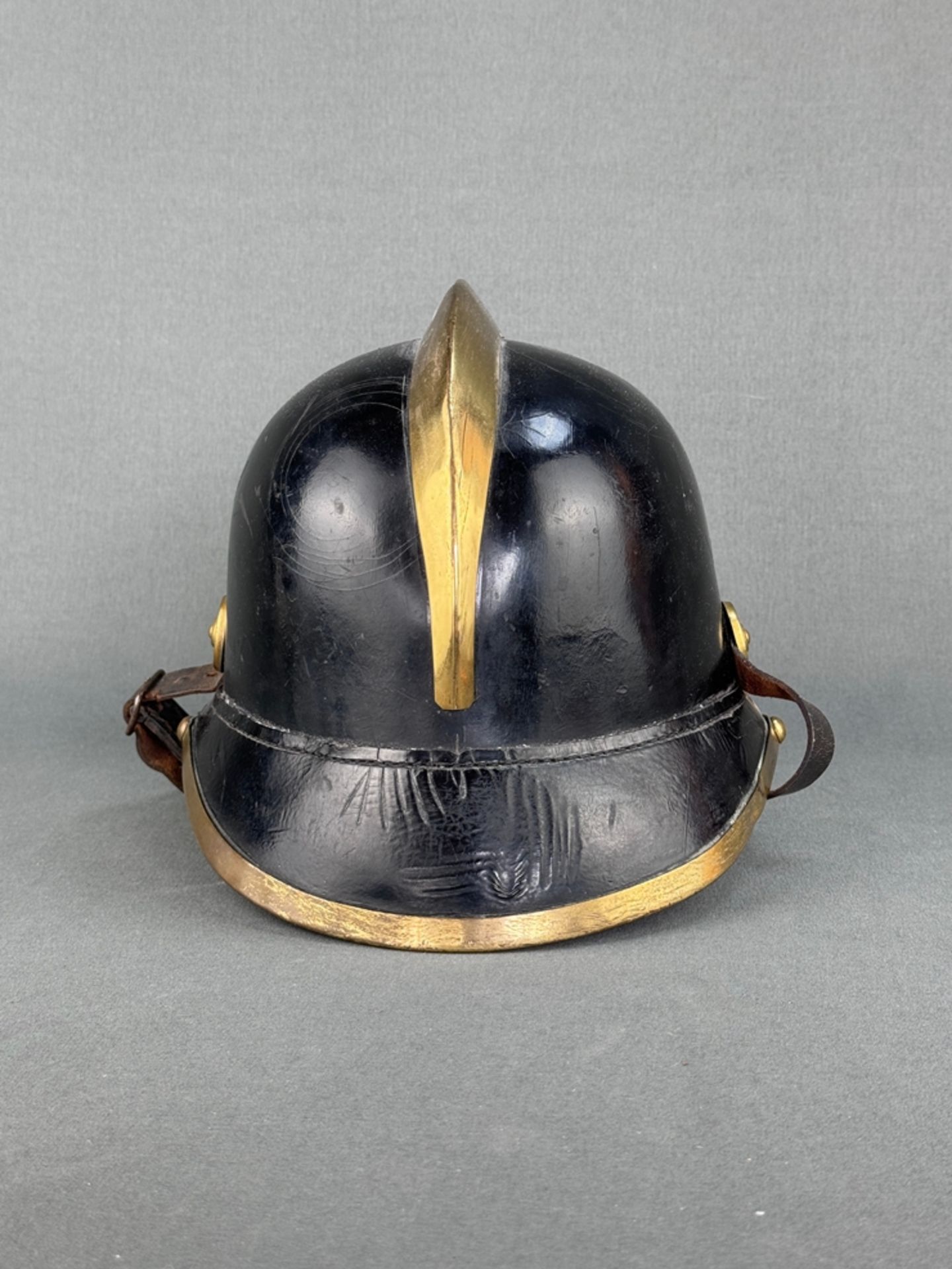 Fire brigade helmet, probably from southern Germany around 1920, covered with black leather - Image 2 of 3