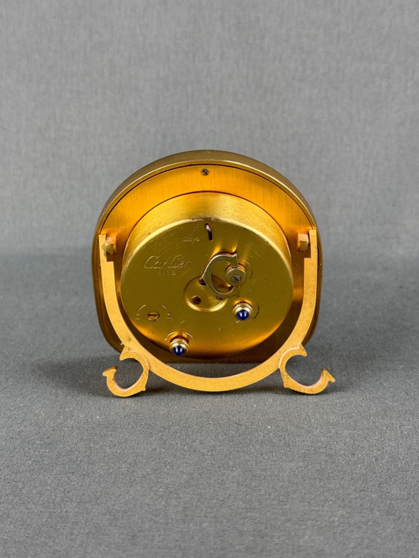 Table clock with alarm function, Cartier, Swiss made, brass case, manual winding, front and verso m - Image 2 of 2