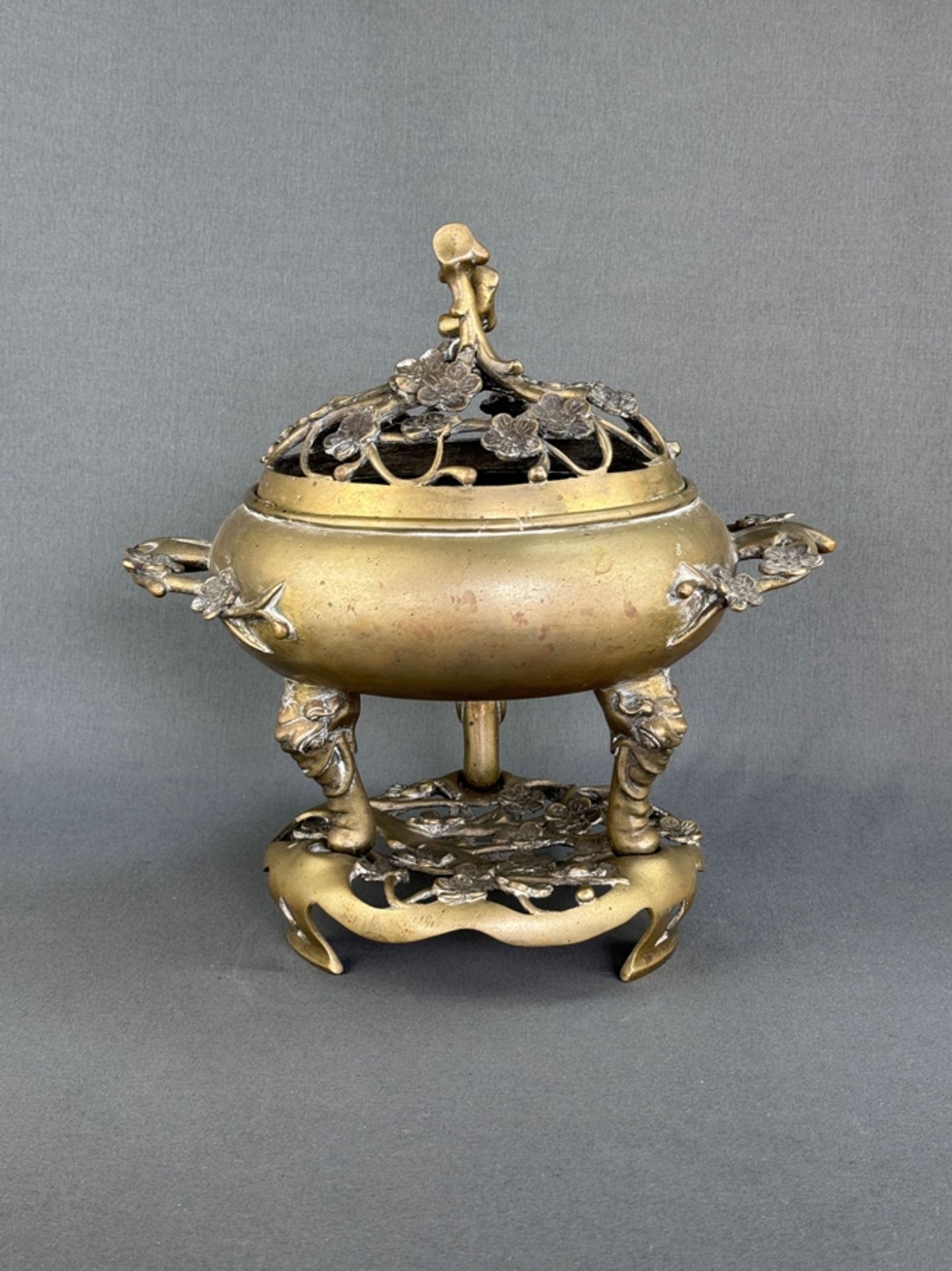 Incense burner, China, brass, decorated with cherry blossom motifs, on stand, height 30cm, diameter