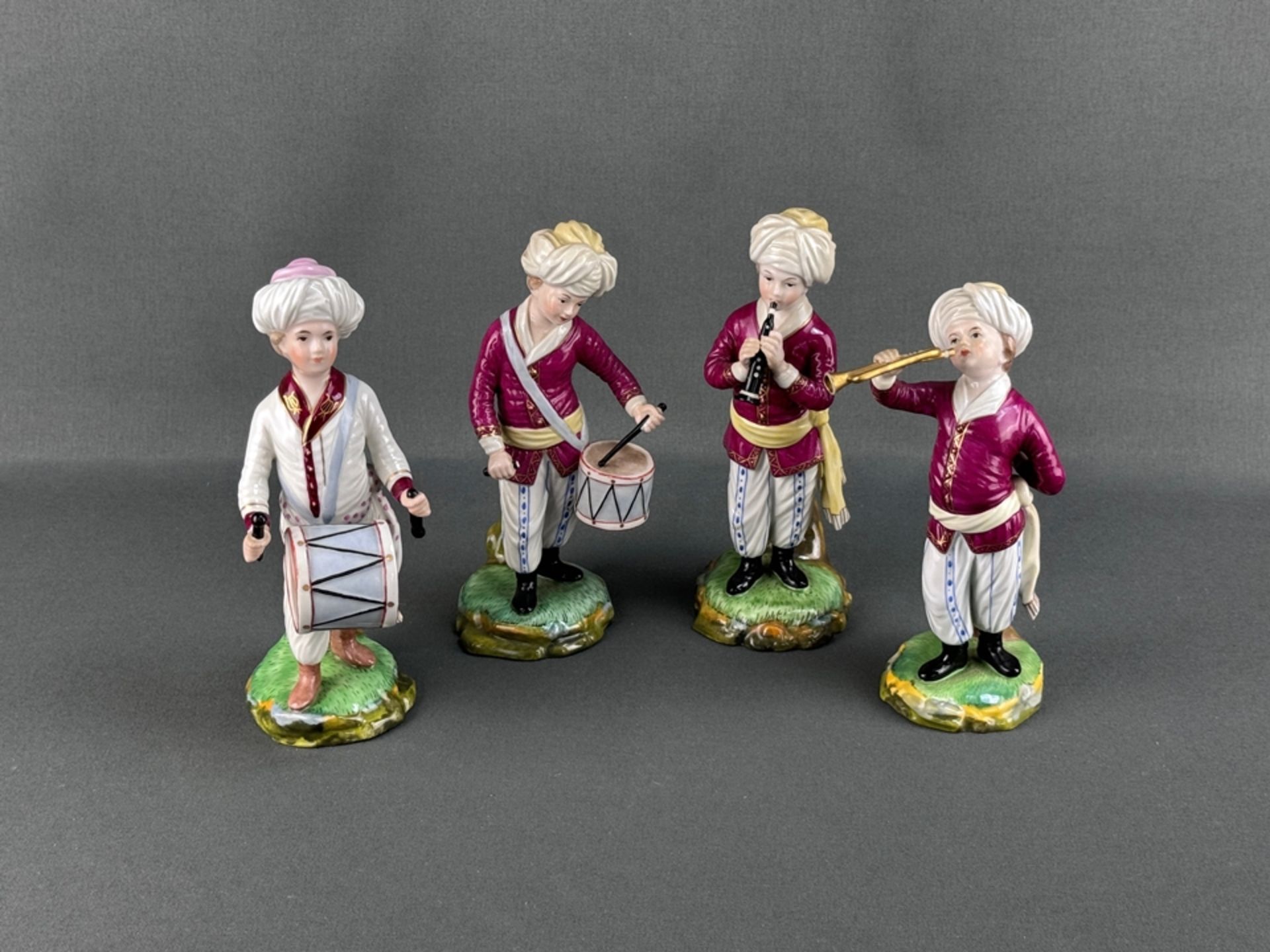 Vier Porzellanfiguren "Musikanten" aus der "Türkischen Kapelle", Höchst, 20. Jahrhundert, davon dre