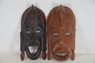 2 African Face Masks. Dimensions (of Biggest) Height 35cm, W