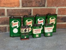 Seven Castrol Oil Cans