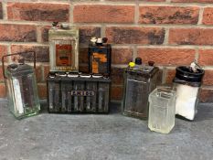 Seven Vintage Glass Exide Batteries