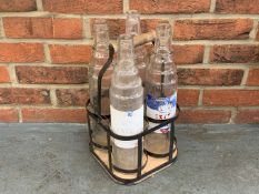 Four Glass Esso Oil Bottles and Holder