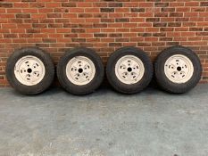 Set of Four Steel Rimmed Land Rover Wheels