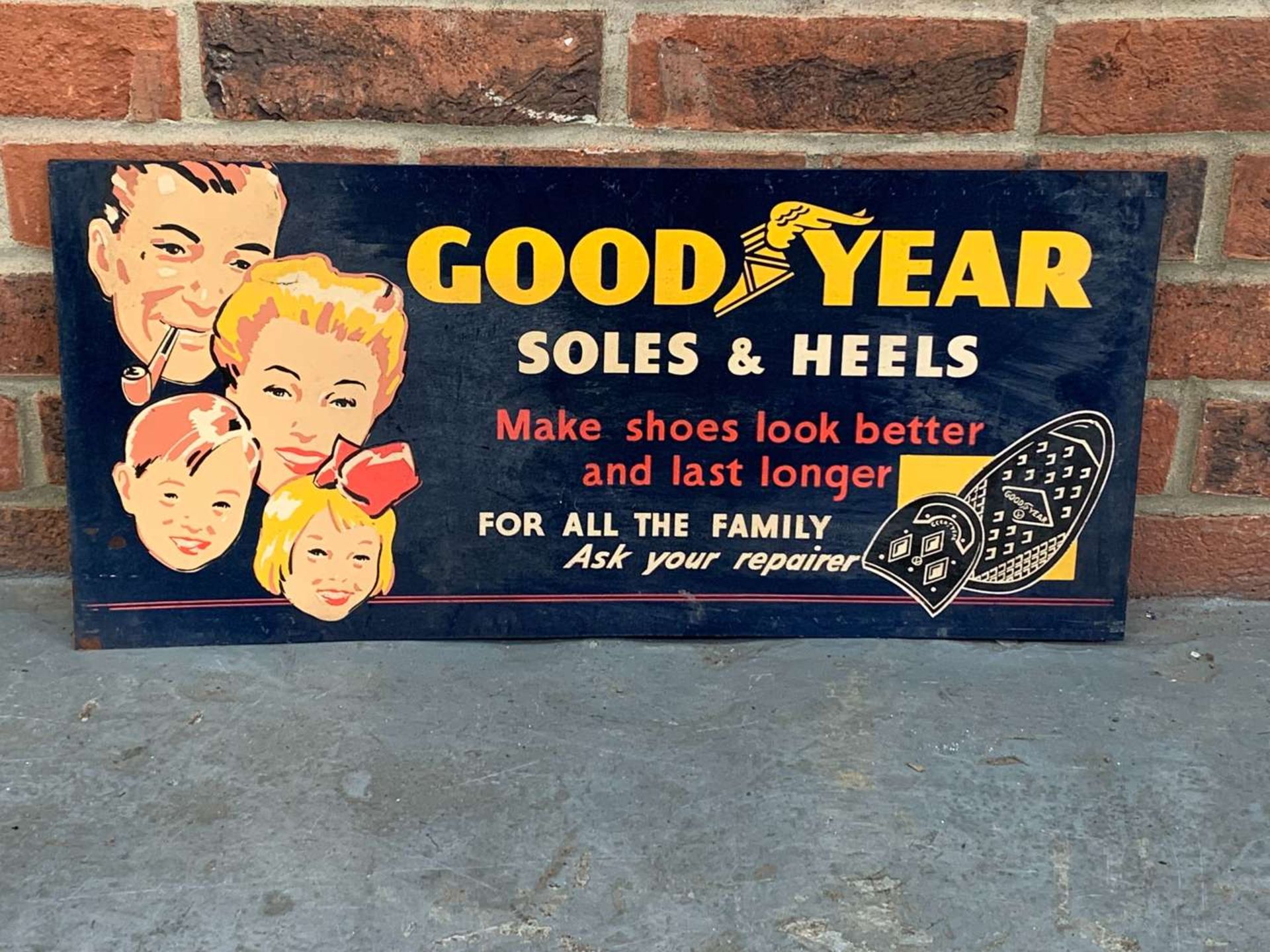 Goodyear Soles and Heels Sign