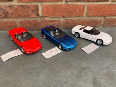 Three Boxed Franklin Mint Corvette Model Cars