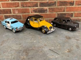 Three Modern Metal Model Cars
