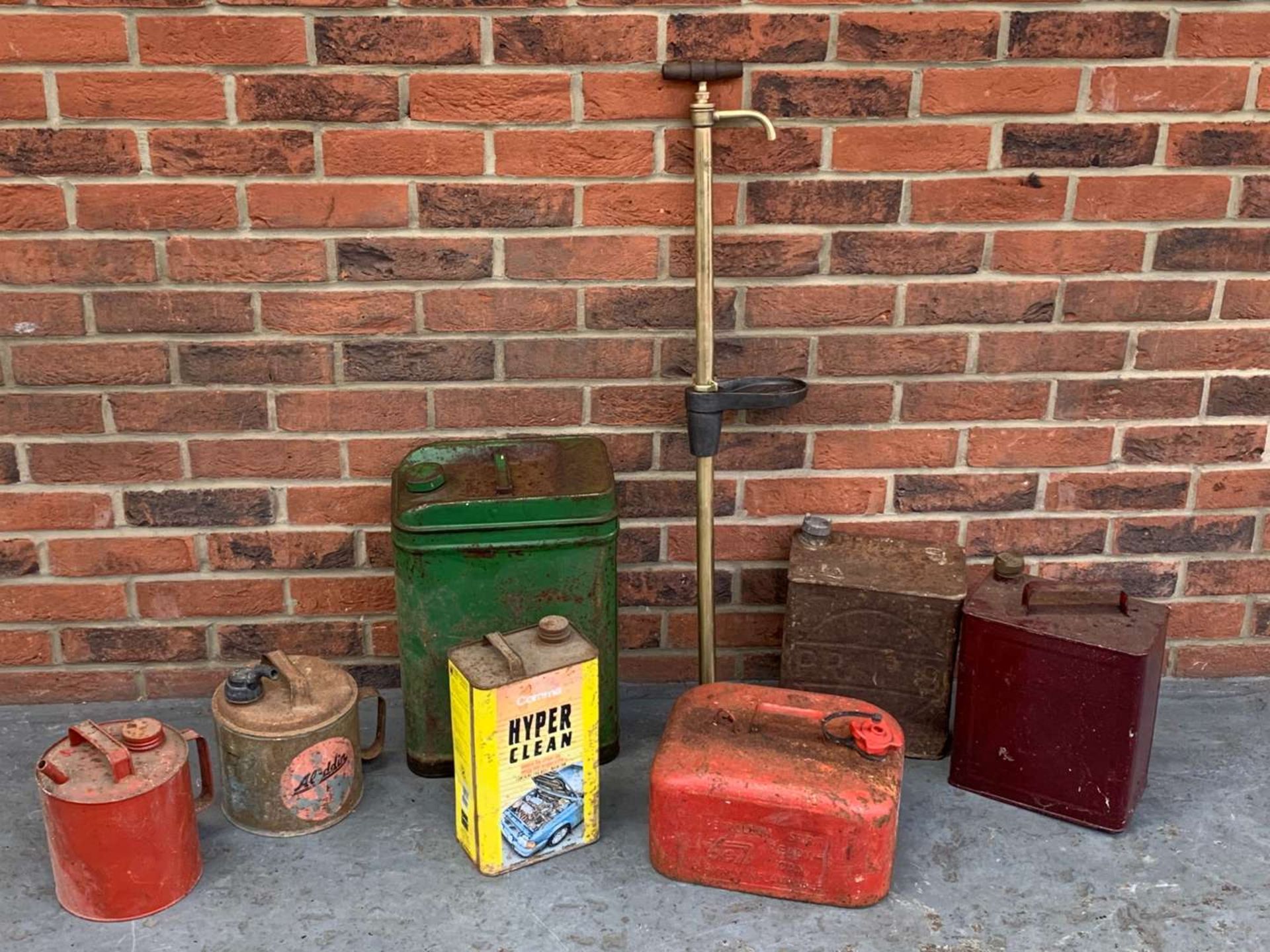 Vintage Brass Pump and Seven Oil Cans (8)