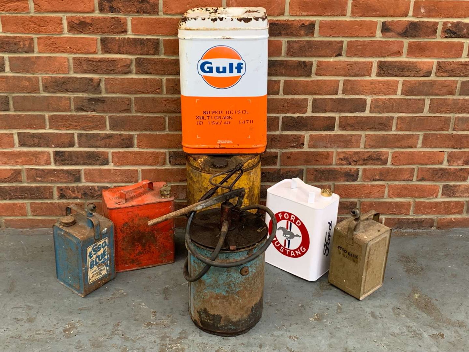 Seven Mixed Grease and Fuel Cans