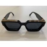 LOUIS VUITTON, a pair of Italian gilt highlighted, black framed sunglasses