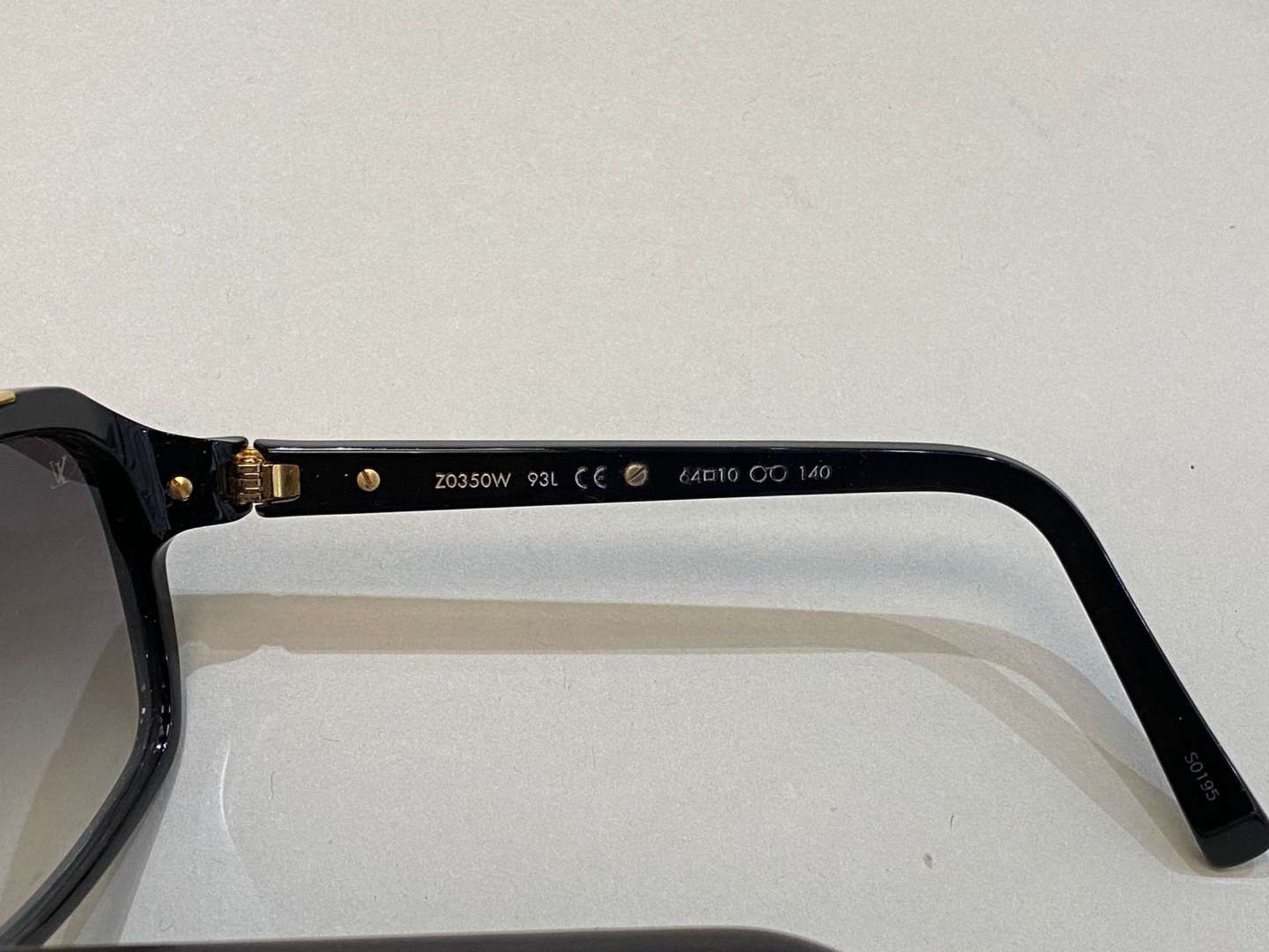 LOUIS VUITTON, a pair of Italian, gilt mounted, black framed sunglasses - Image 3 of 3