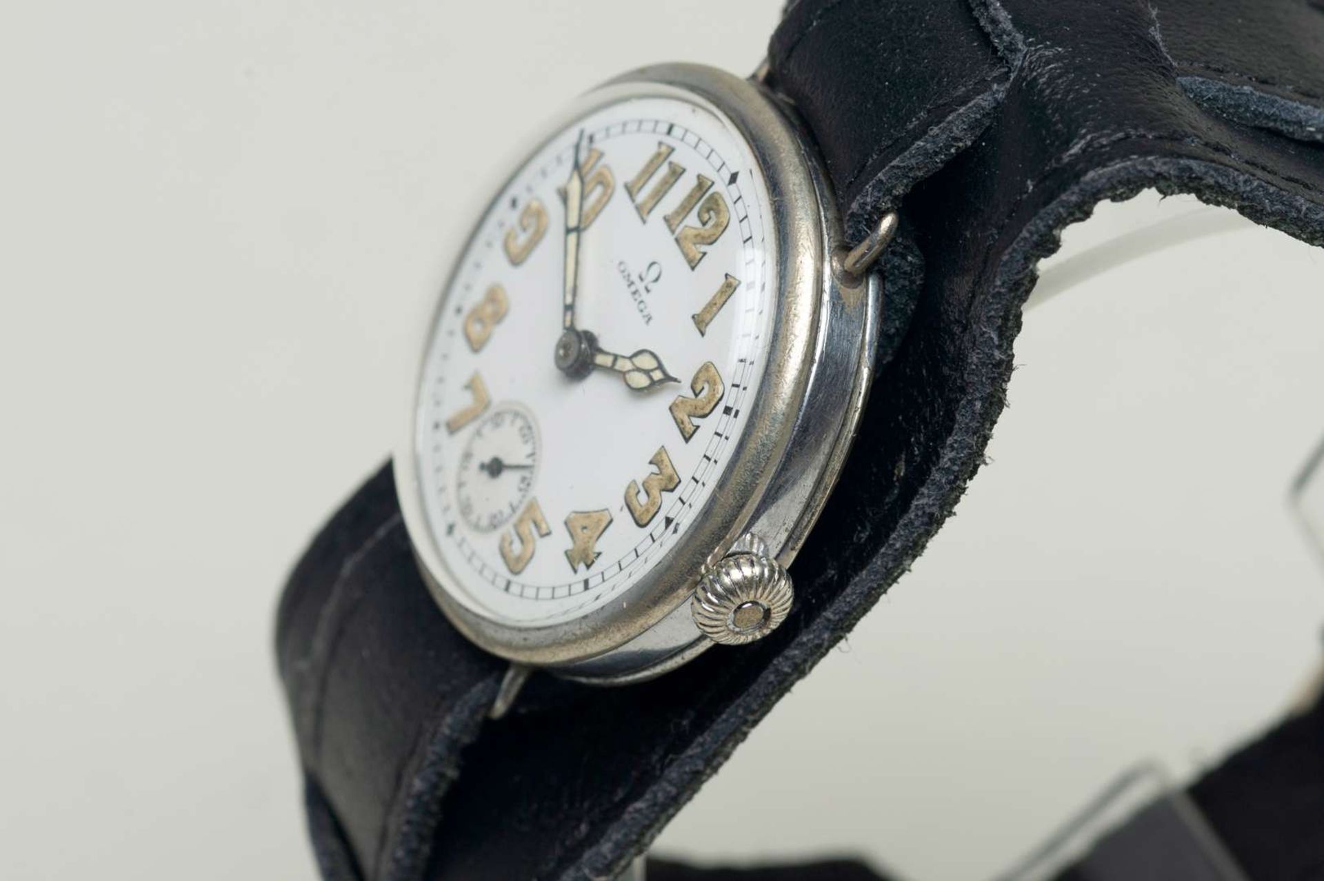 OMEGA. an early 20th century base metal cased wristwatch. - Image 2 of 7