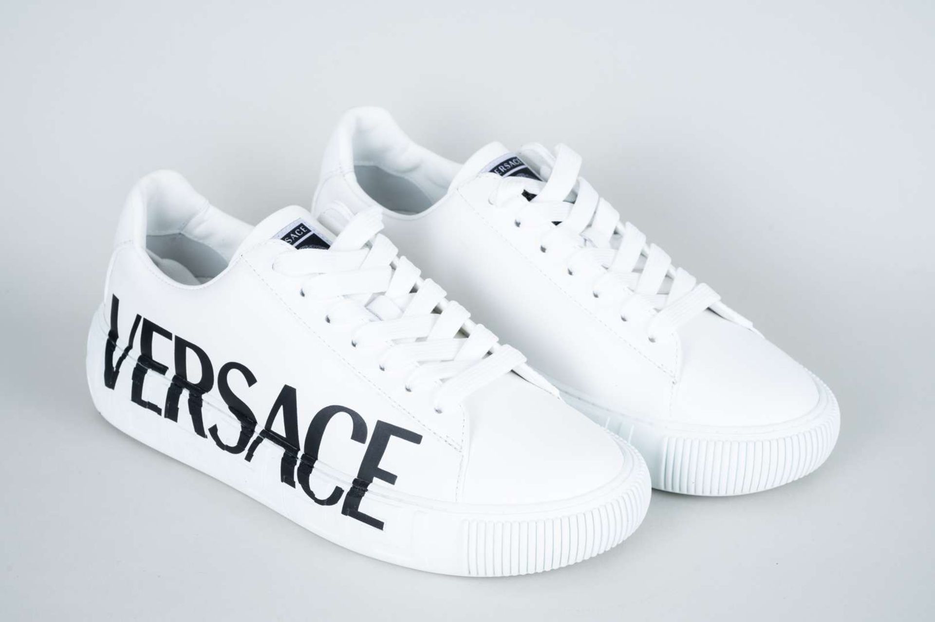 VERSACE, a pair of Greca trainers