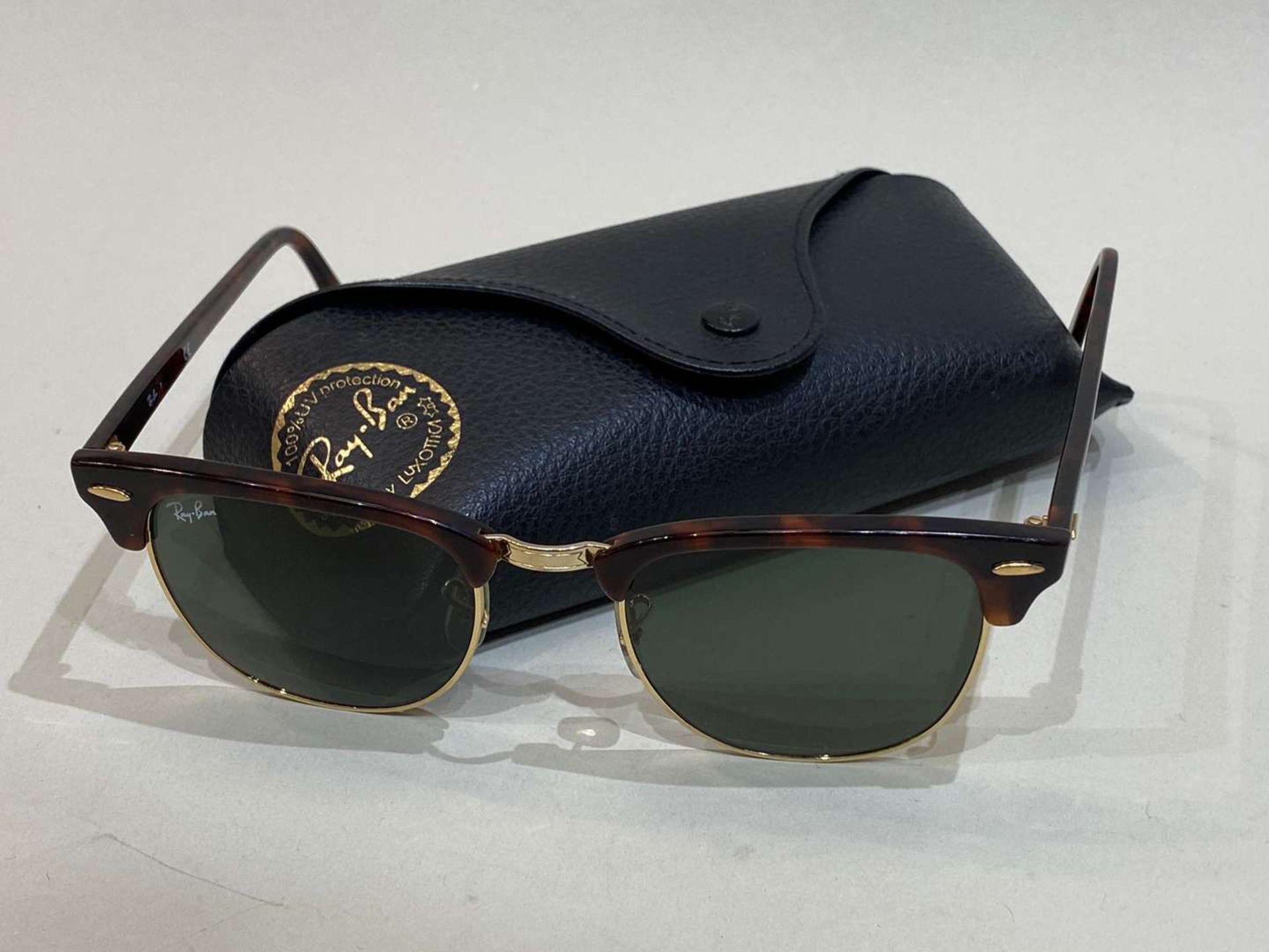 RAY-BAN, a pair of Clubmaster, gilt and tortoiseshell sunglasses