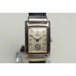 OMEGA. a first half of the 20th century, rectangular silver cased wristwatch,