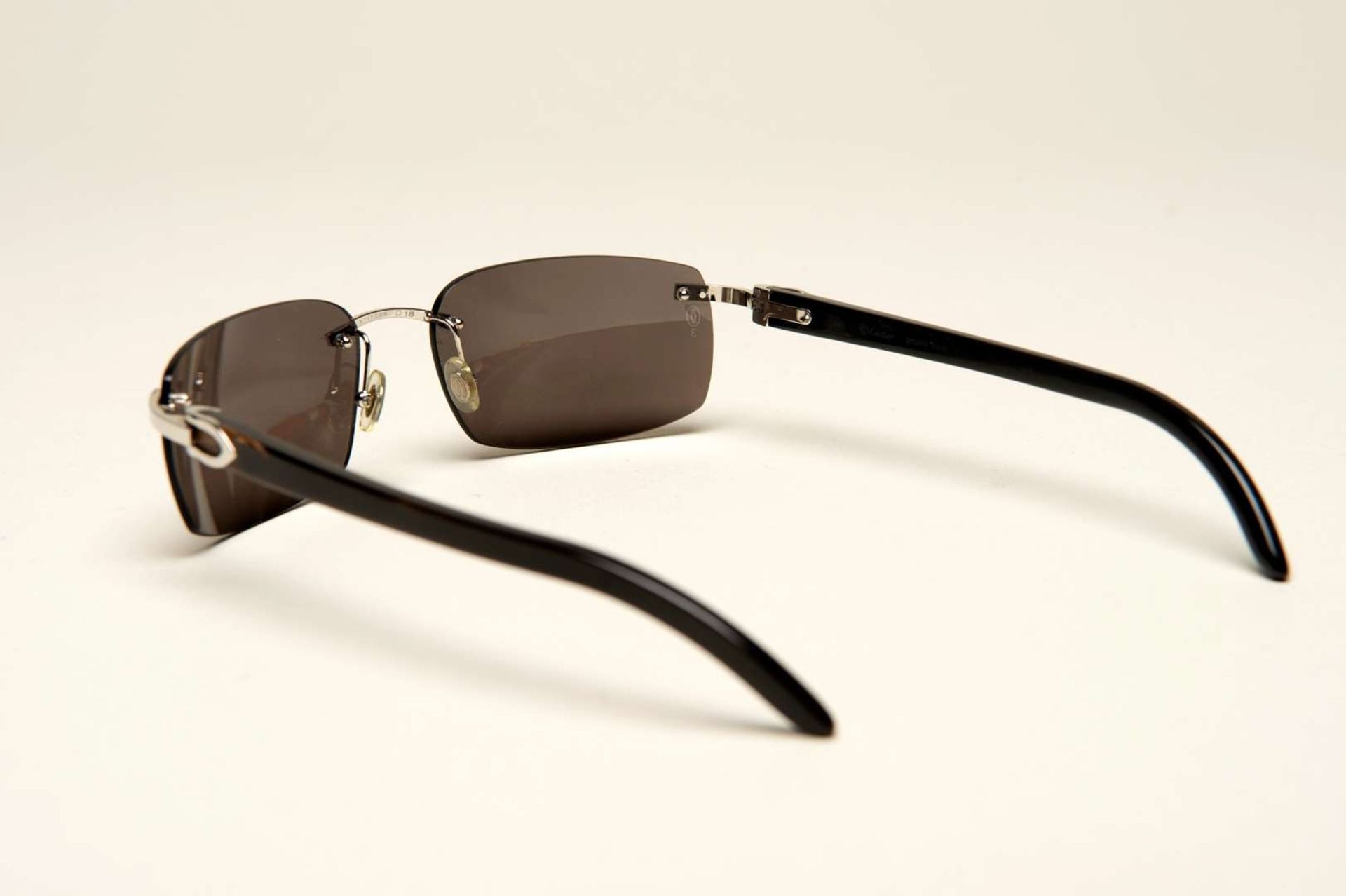 CARTIER, a &nbsp;pair of French rimless, horn armed sunglasses - Image 4 of 5