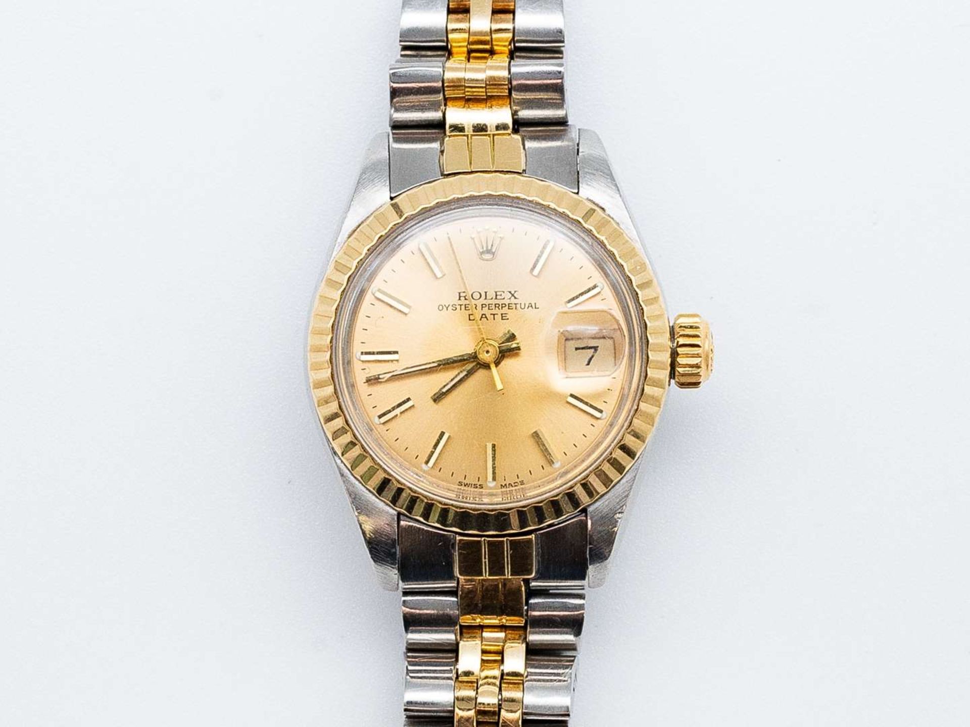 ROLEX, Date, 6917, a late 20th century stainless steel and gold, calendar wristwatch.