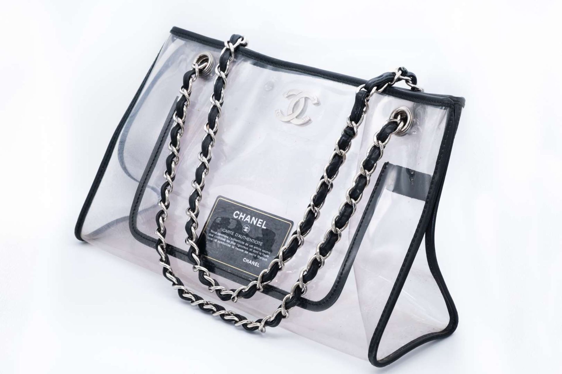 CHANEL, PVC tote bag, with black leather trim and silver curb link chain carry strap. 2006-2008 - Bild 3 aus 4