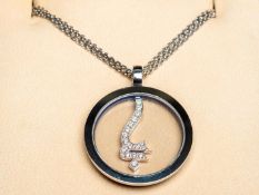 CHOPARD for GODOLPHIN, a modern 18ct white gold and diamond set pendant and chain