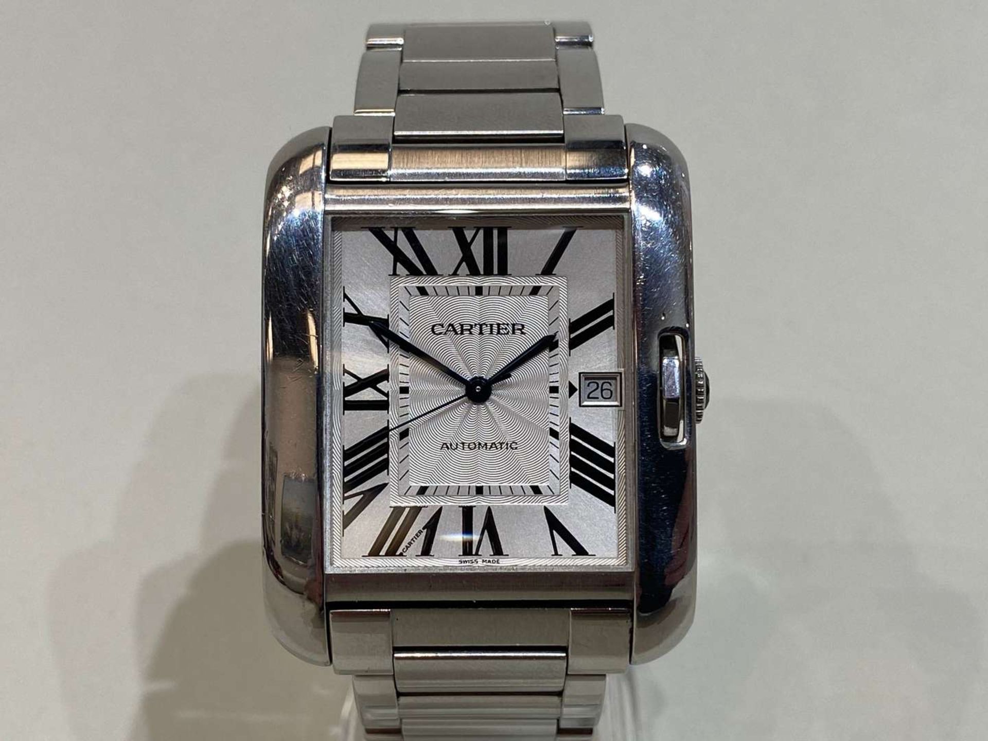 CARTIER, TANK ANGLAISE, XL, a 2014, stainless steel, automatic, centre seconds, calendar wristwatch.