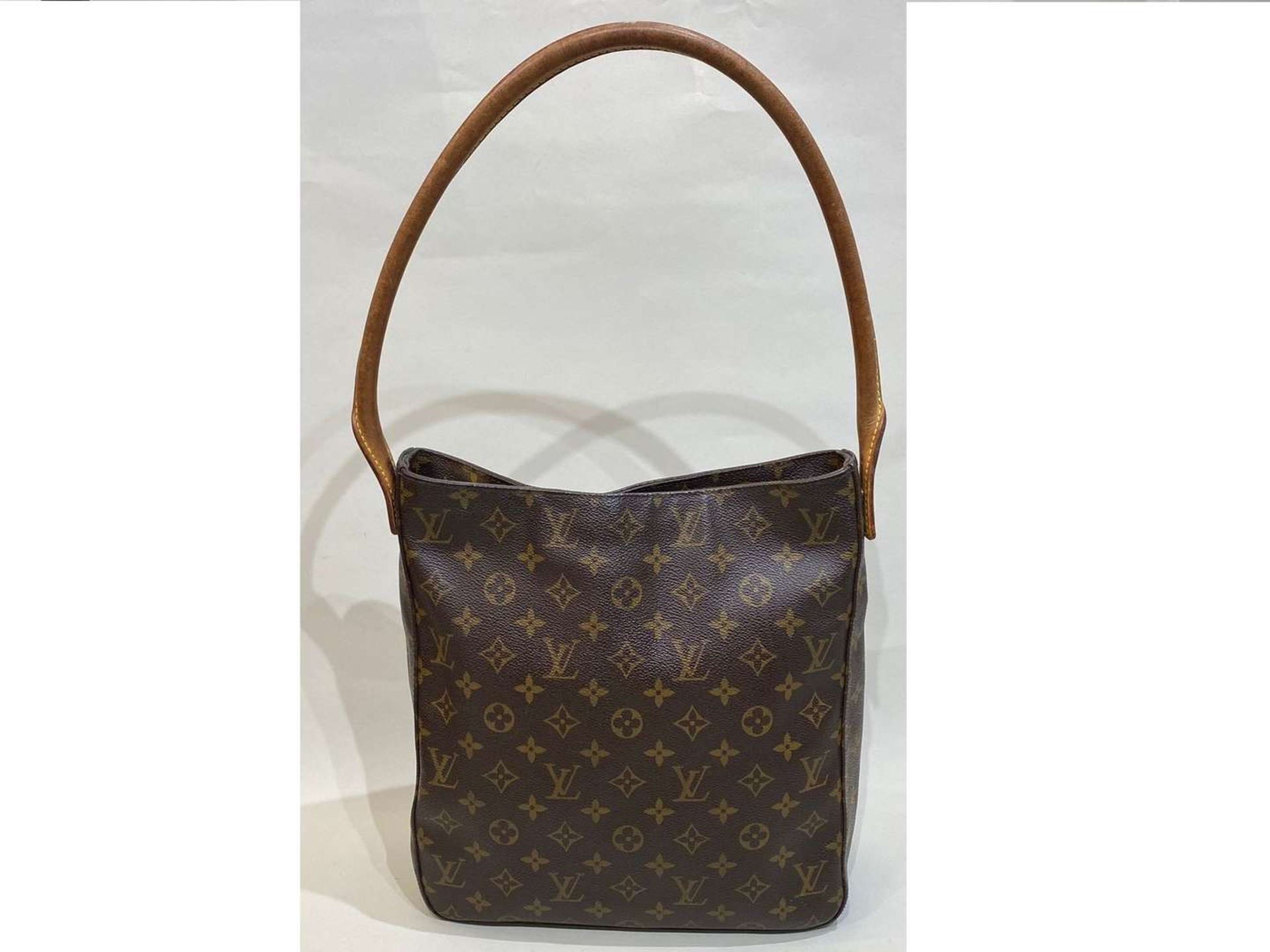 LOUIS VUITTON, Looping, tan stitched leather and monogrammed shoulder bag