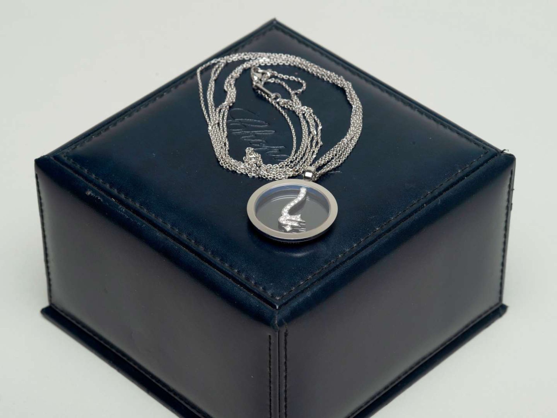 CHOPARD for GODOLPHIN, a modern 18ct white gold and diamond set pendant and chain - Image 3 of 3