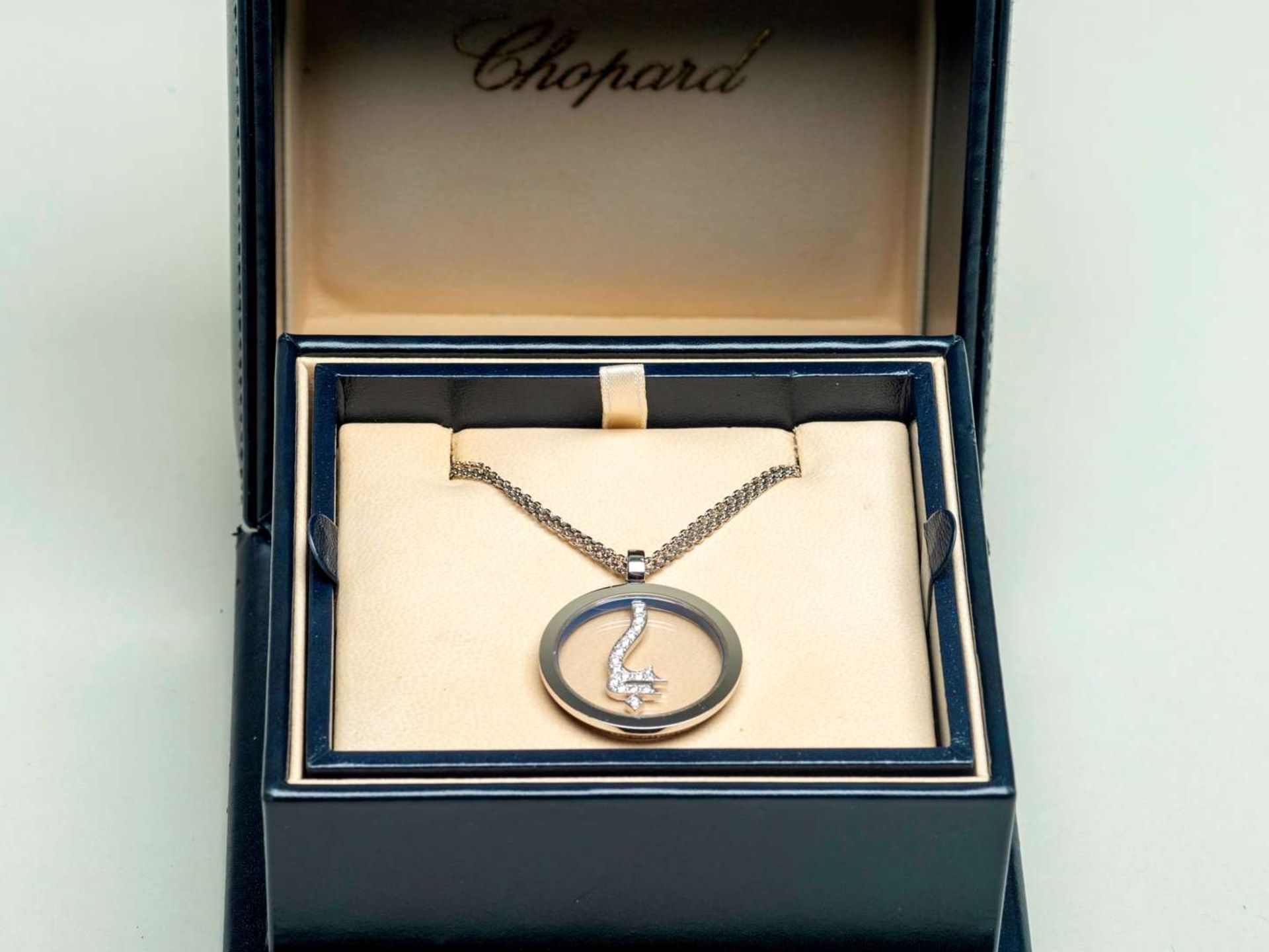 CHOPARD for GODOLPHIN, a modern 18ct white gold and diamond set pendant and chain - Image 2 of 3